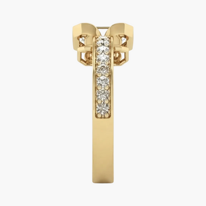 A yellow gold ring shown from the side on a clean white background, featuring a pavé diamond center channel and geometric diamond-shaped side accents.