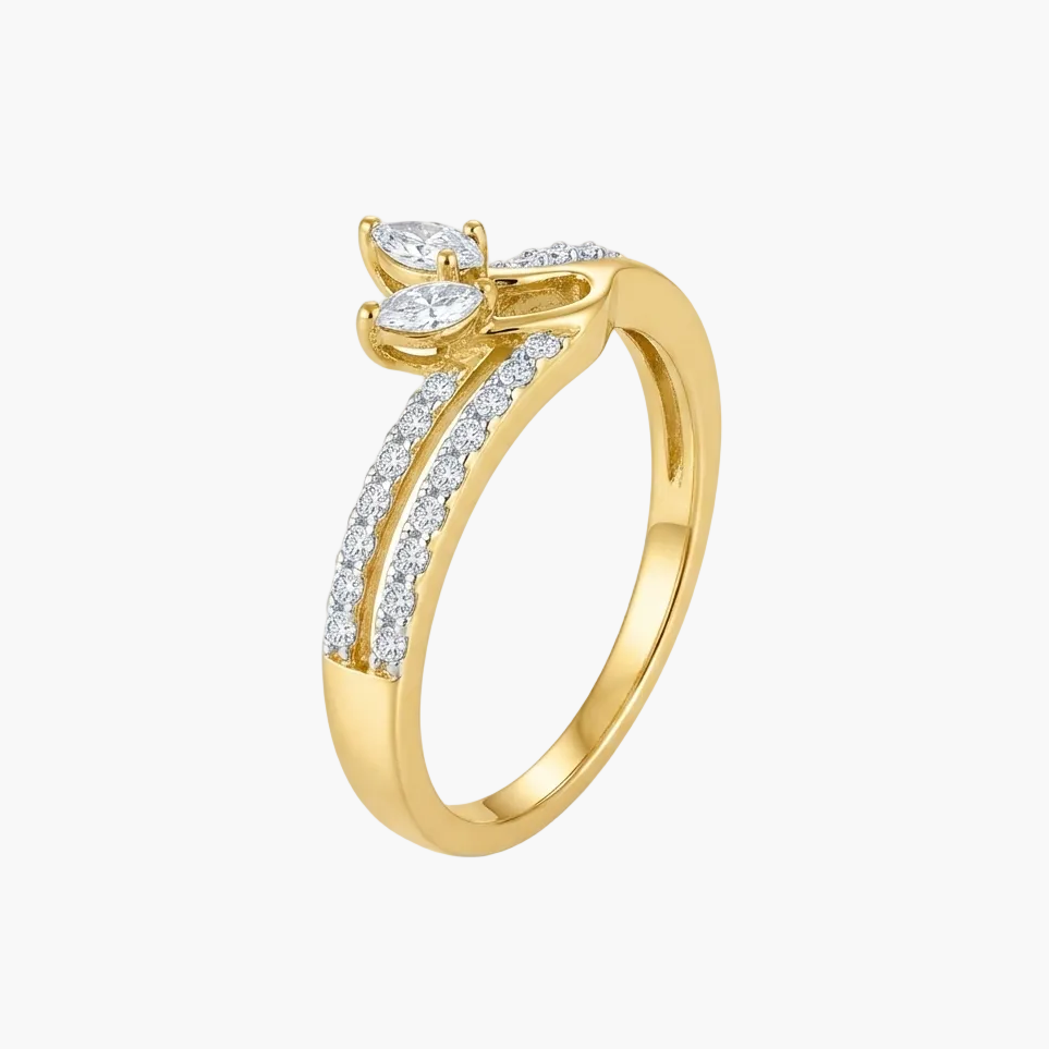 A yellow gold ring featuring a marquise-cut diamond center stone and a pavé-set row of round diamonds along the shank, shown on a clean white background.