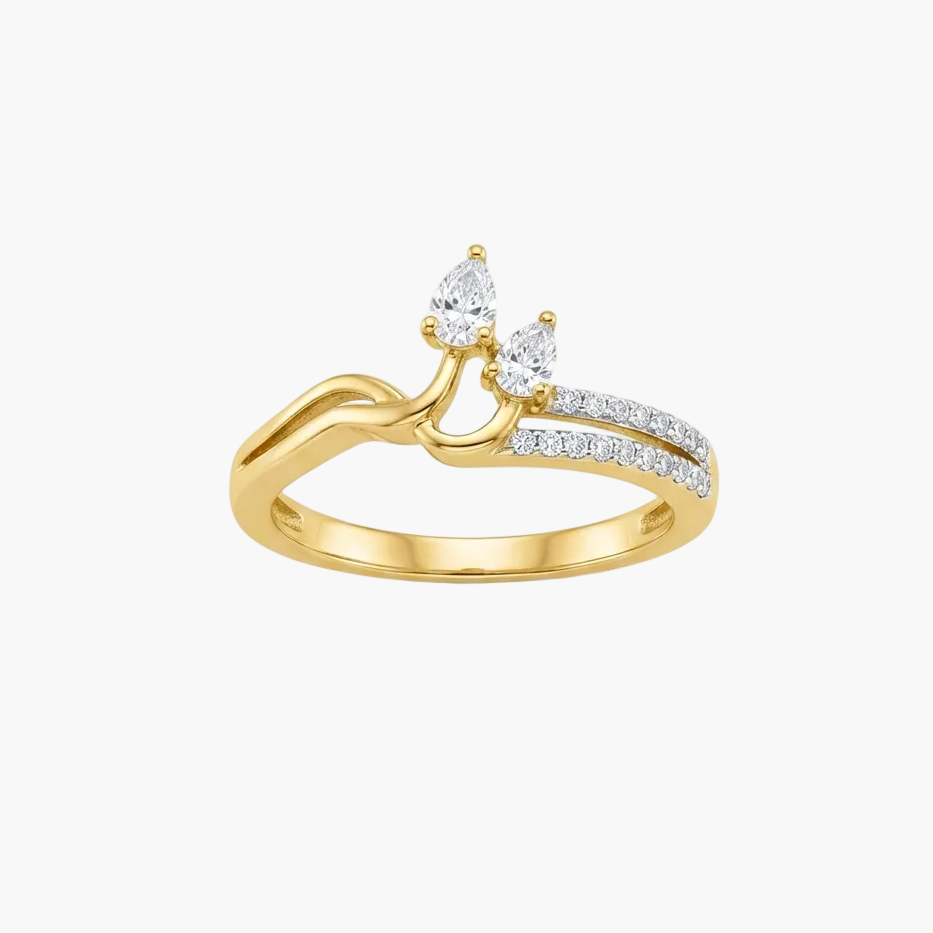 A yellow gold ring featuring two pear-cut clear gemstones at the top and a pavé-set row of small clear stones along one branch, shown on a clean white background.