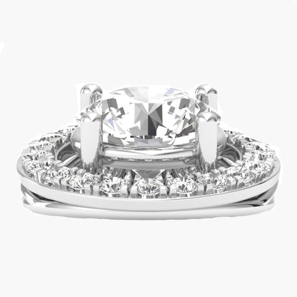 Diamond ring with a large central gemstone and smaller diamonds around on a white background