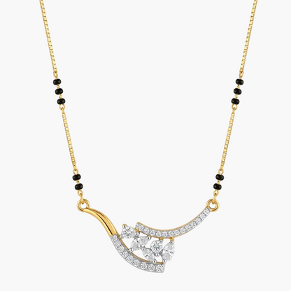 A gold chain necklace with a curved pendant featuring clear stones and small black bead accents on the chain, shown on a plain white background.