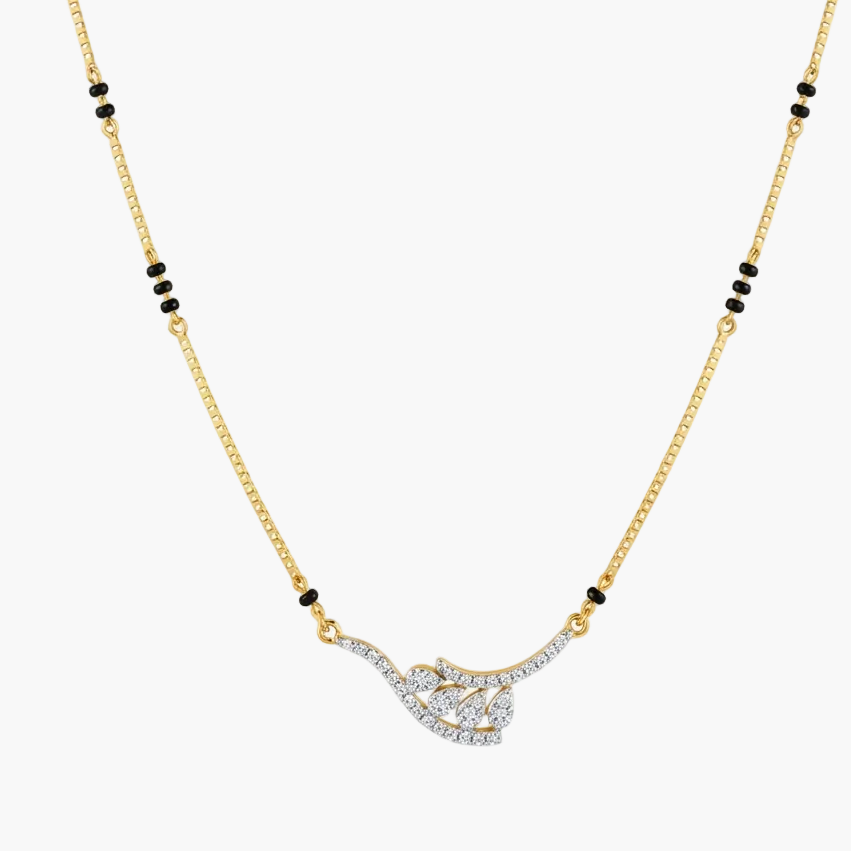 A gold chain necklace featuring a central pendant paved with clear stones in a curved, openwork design, accented by small black beads spaced along the chain, set against a light gray background.