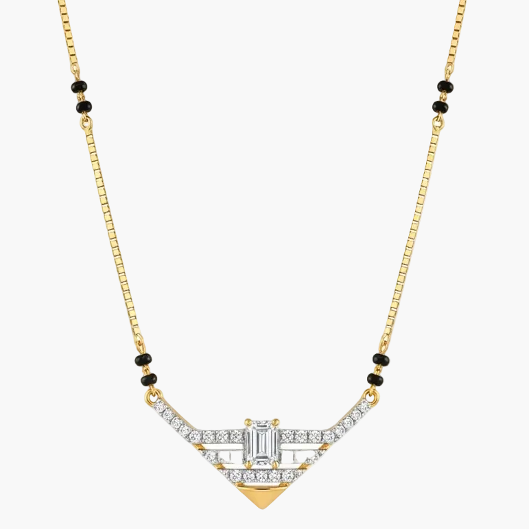A gold chain necklace with a geometric Art Deco style pendant, featuring clear baguette and round-cut stones, accented with small black beads on the chain, shown against a plain white background.