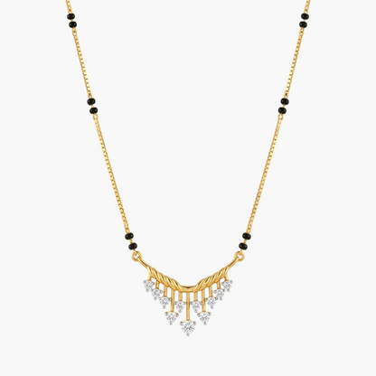 A gold chain necklace with a V-shaped pendant featuring twisted gold bars, small black beads along the chain, and clear triangular gemstones hanging from the center, shown on a plain white background.