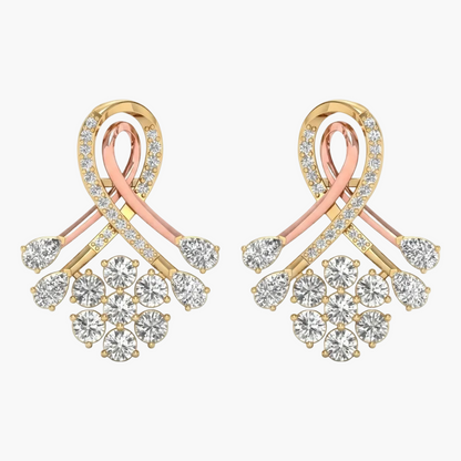 Pair of gold and rose gold earrings with diamond accents on a white background