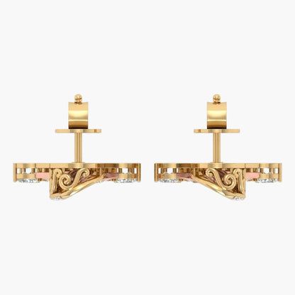 Pair of gold earrings with intricate designs on a white background