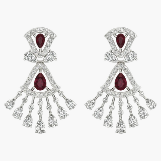 Pair of earrings with red gemstones and diamond-like stones on a white background