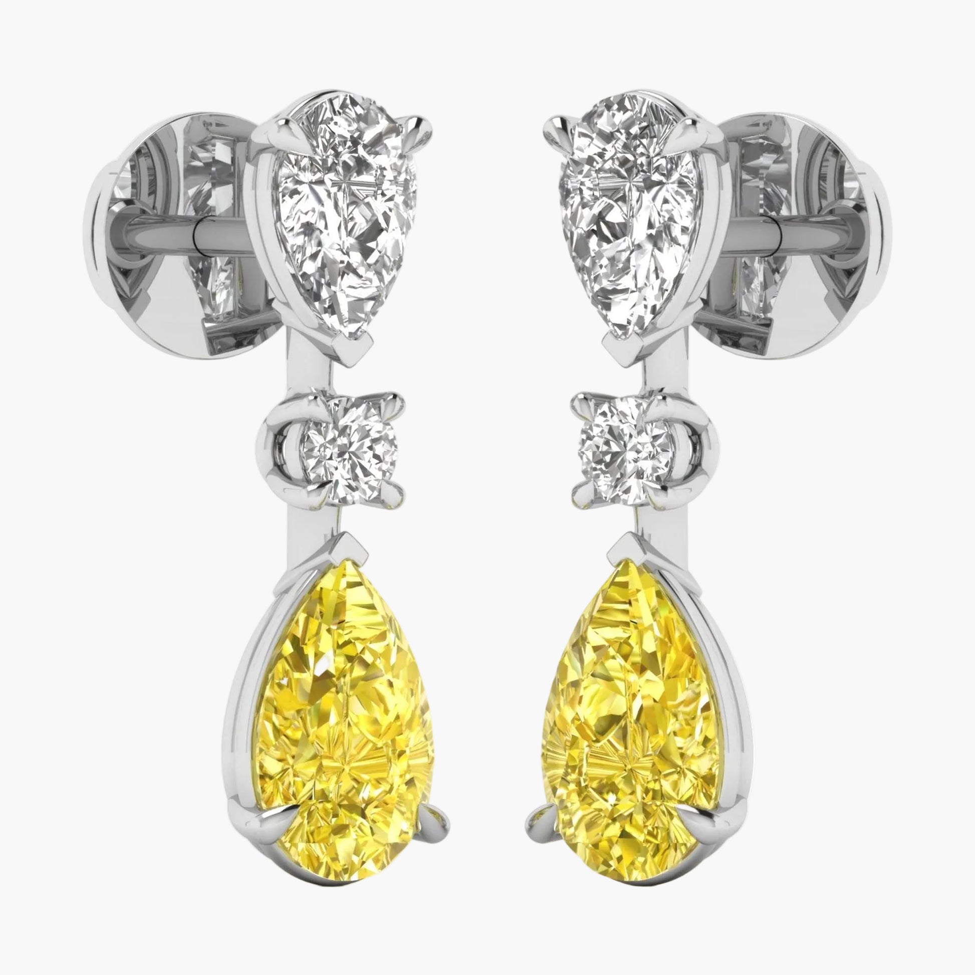 Pair of earrings with yellow teardrop stones and clear gemstones on a white background.