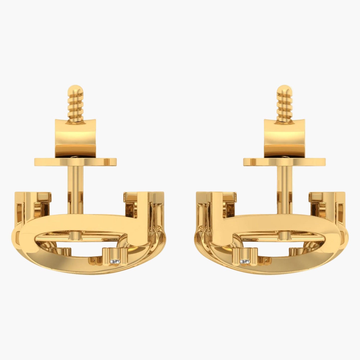 Gold earrings on a white background