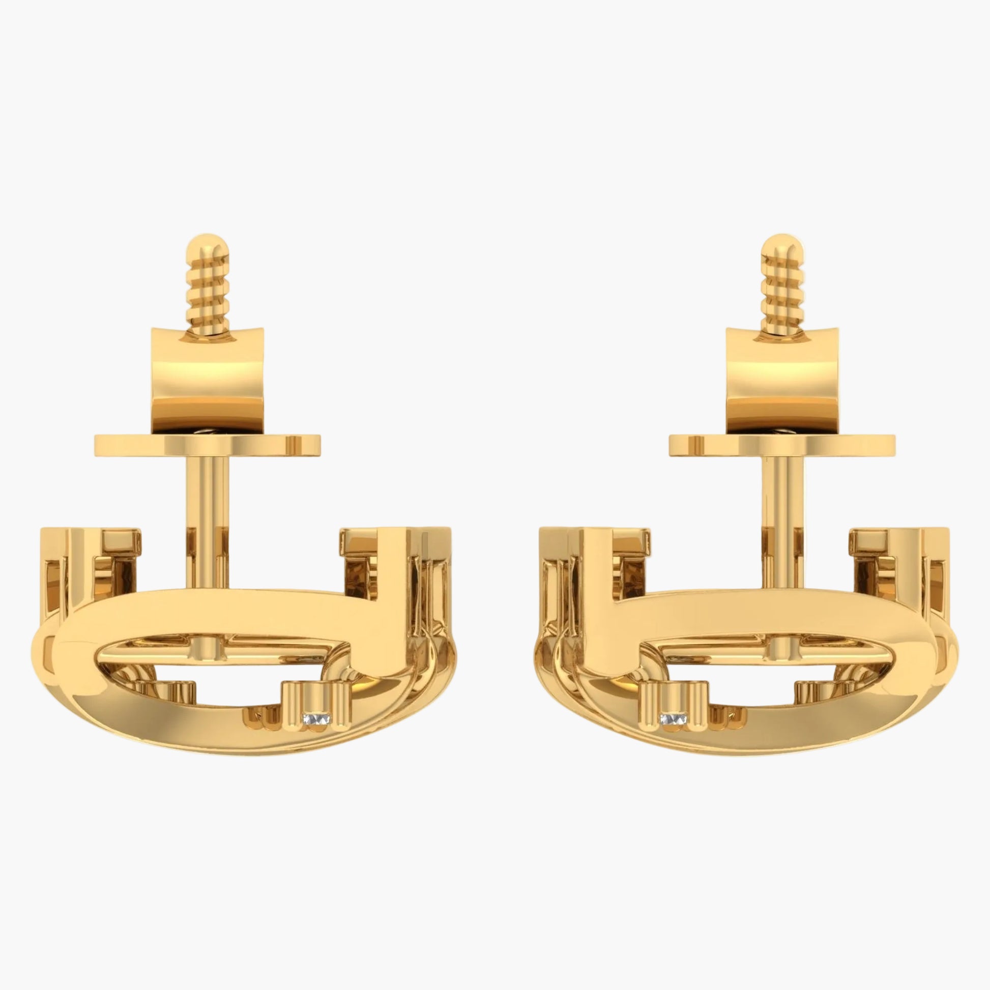 Gold earrings on a white background