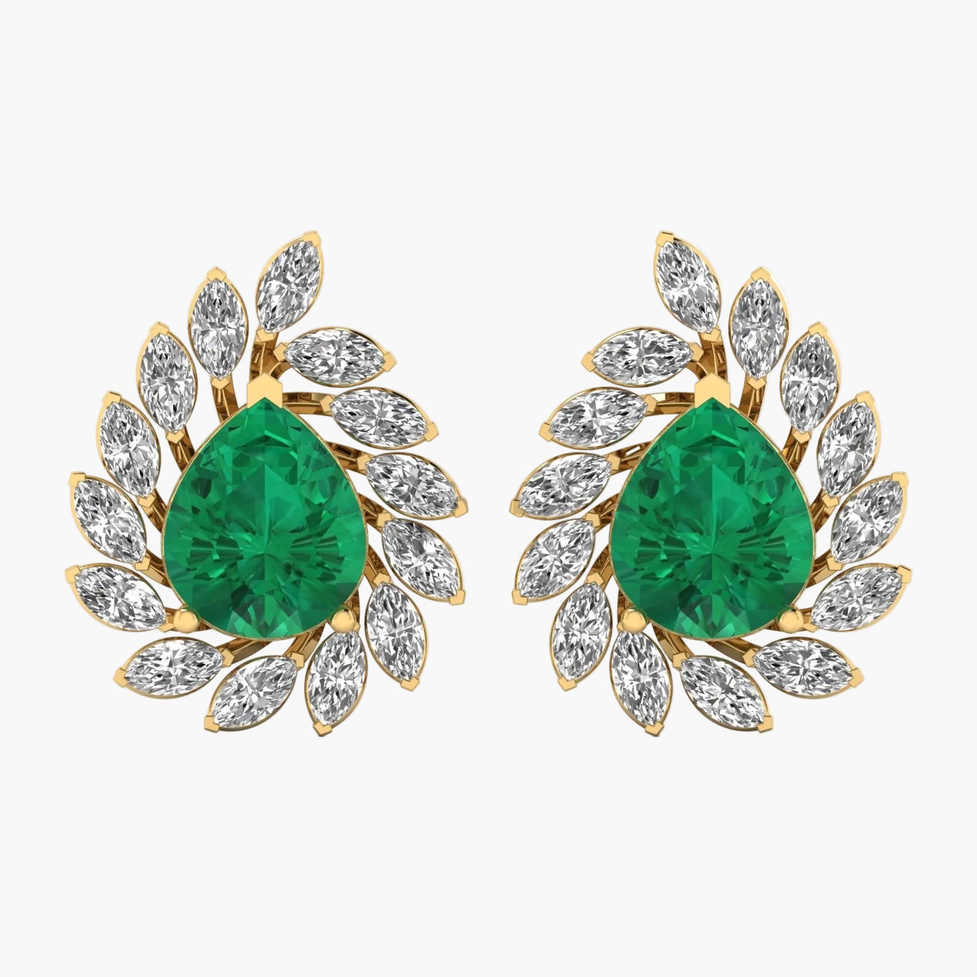Pair of emerald green teardrop earrings with gold and diamond accents on a white background