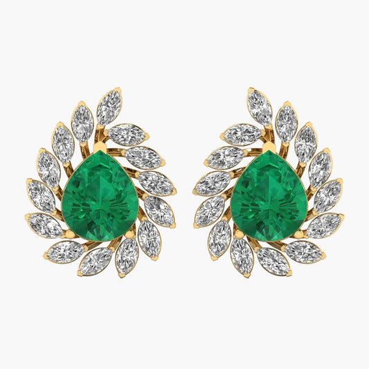 Pair of emerald green teardrop earrings with gold and diamond accents on a white background