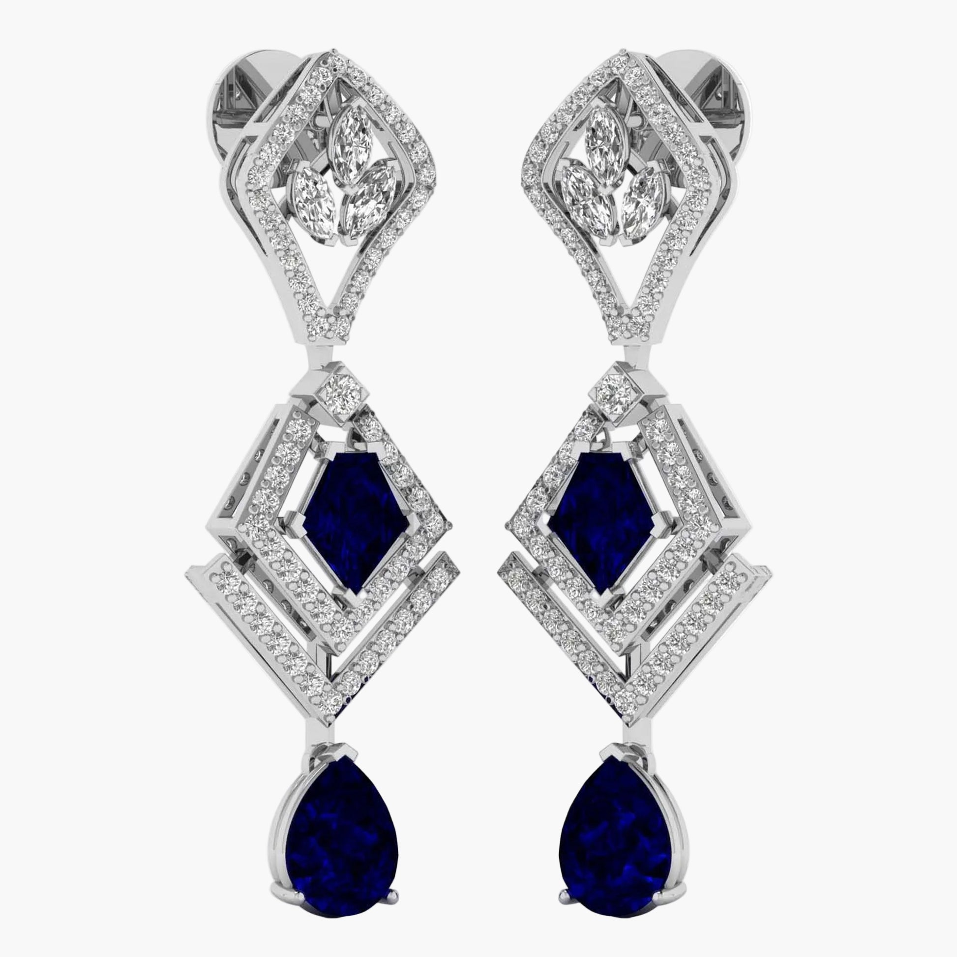 Pair of earrings with blue gemstones and diamond-like stones on a white background