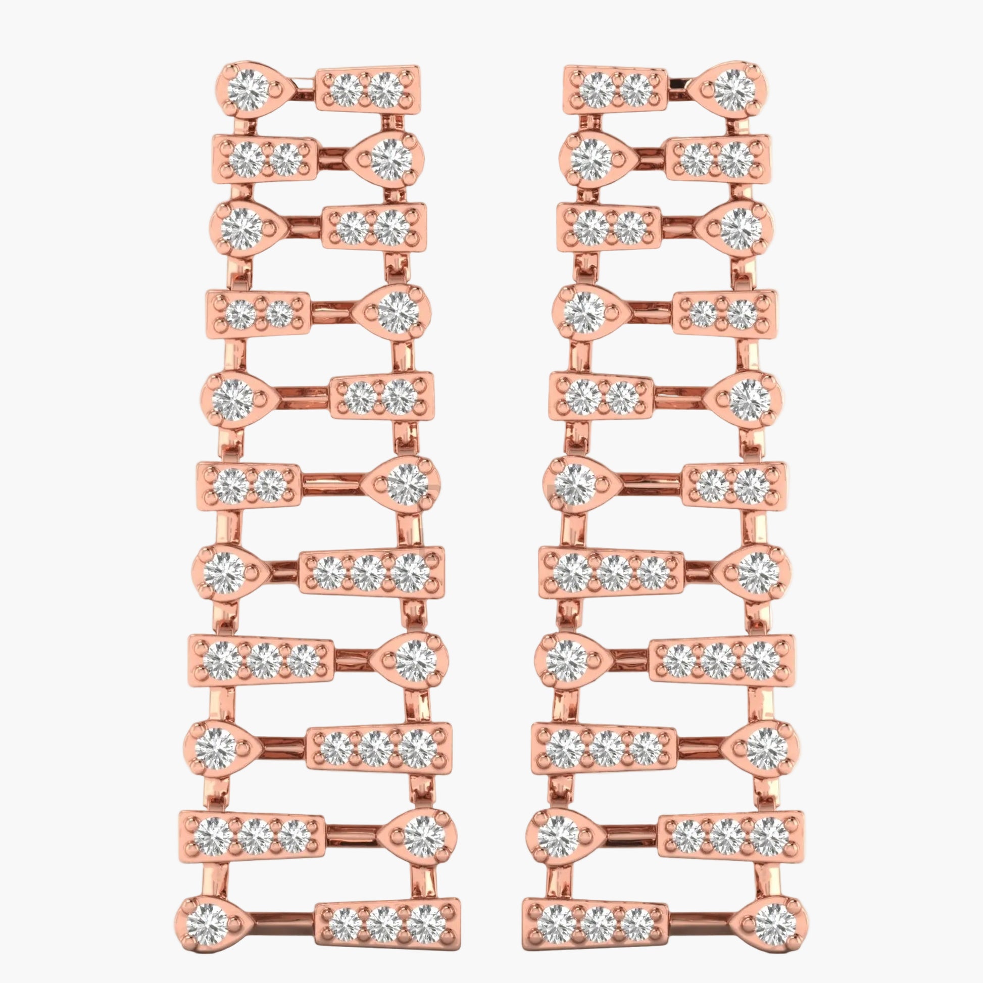 Rose gold earrings with clear gemstones on a white background