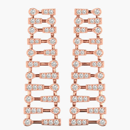 Rose gold earrings with clear gemstones on a white background