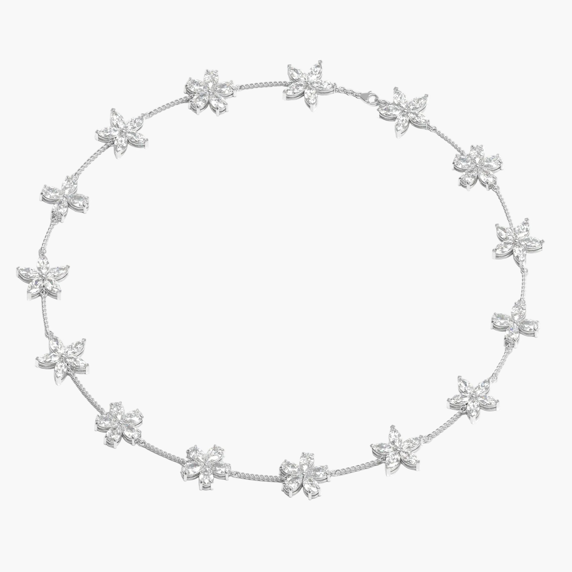 Silver necklace with star-shaped pendants on a white background