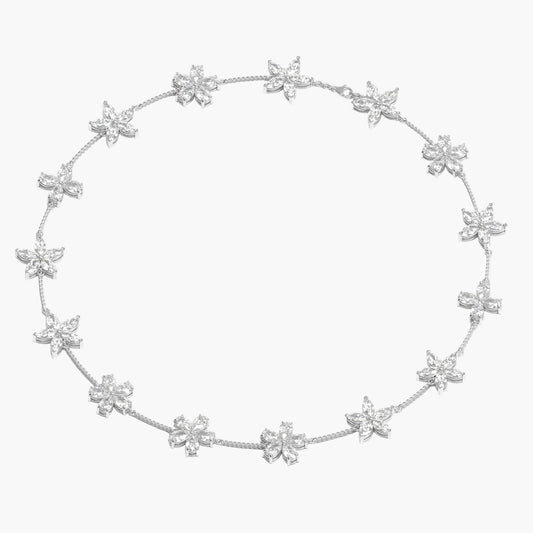 Silver necklace with star-shaped pendants on a white background