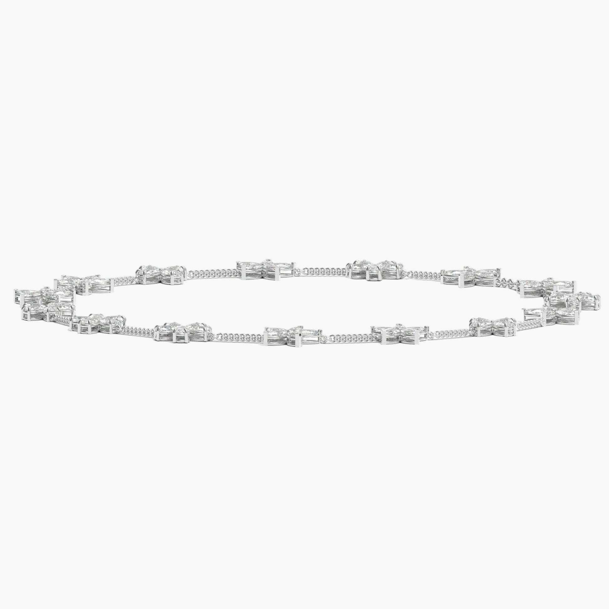 Silver bracelet with baguette-cut diamonds on a white background