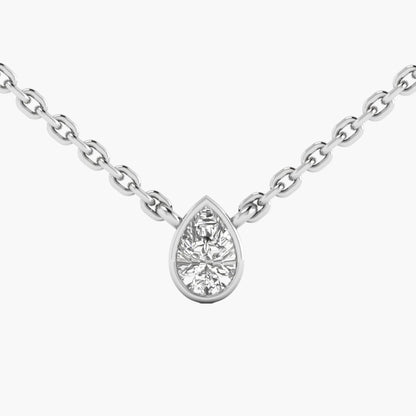 Teardrop-shaped diamond pendant on a chain against a white background
