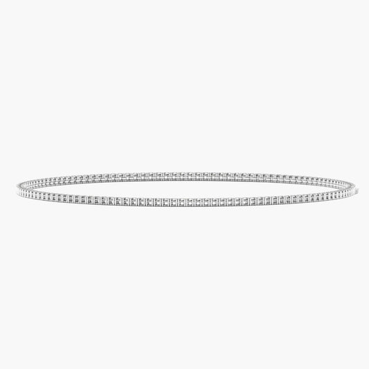 Thin silver bracelet on a white background