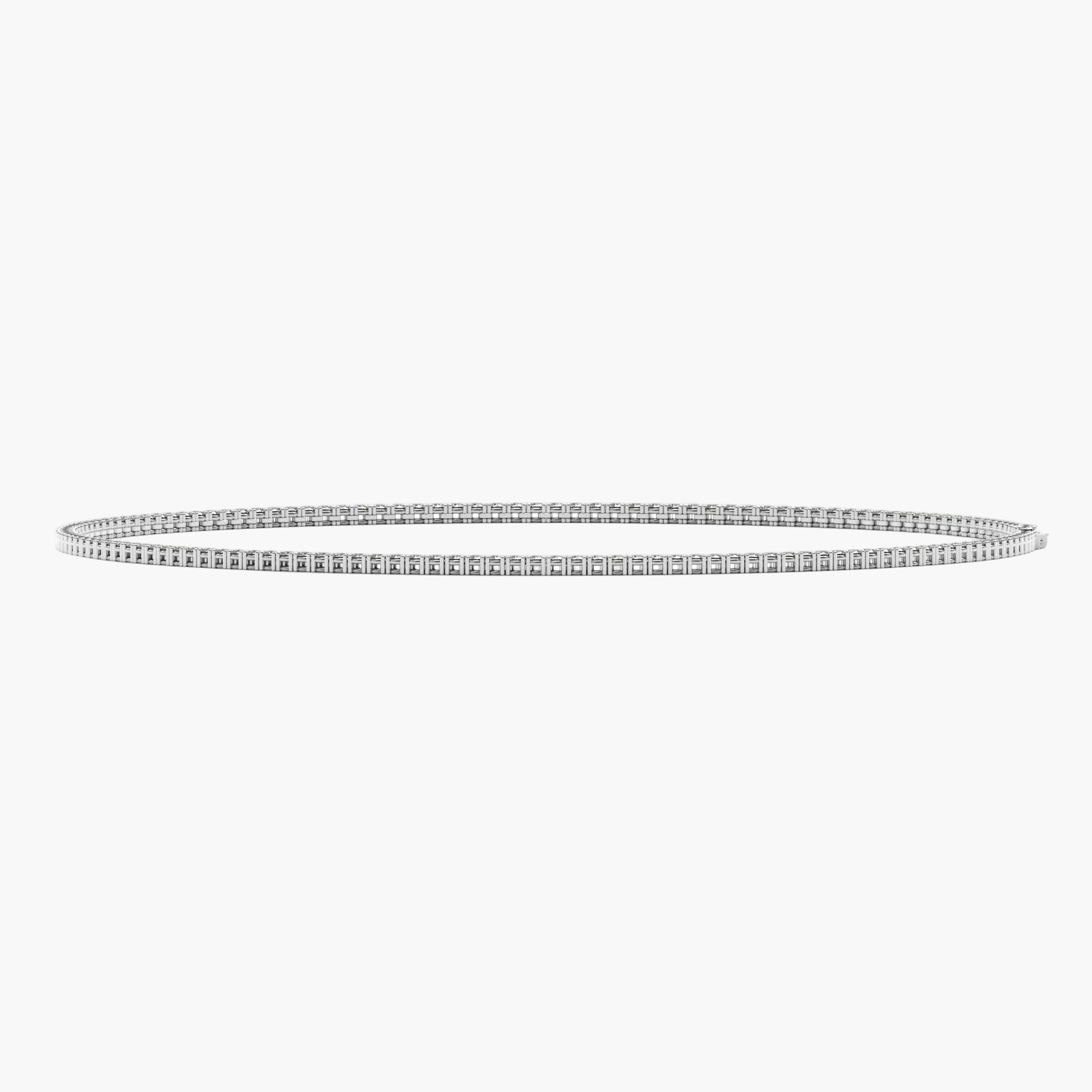 Thin silver bracelet on a white background