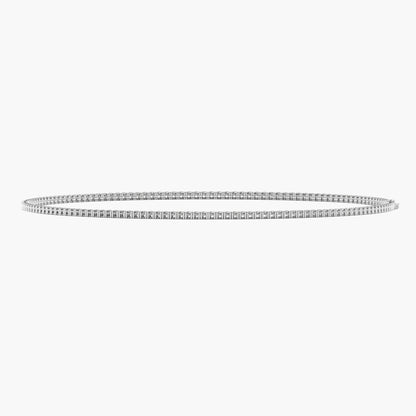 Thin silver bracelet on a white background