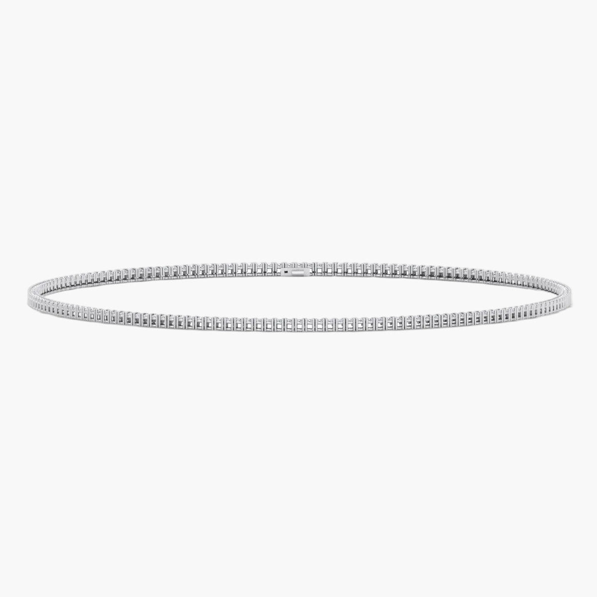 Silver bangle on a white background