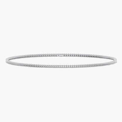 Silver bangle on a white background
