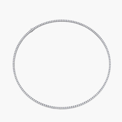 Silver hoop earring on a white background