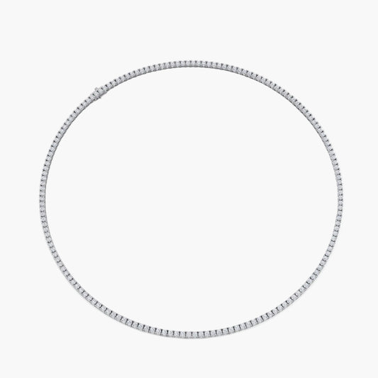 Silver hoop earring on a white background