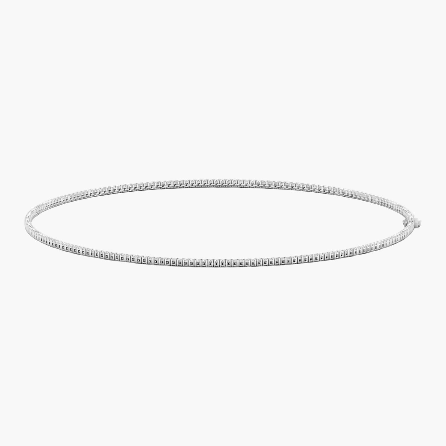 Silver hoop earring on a white background
