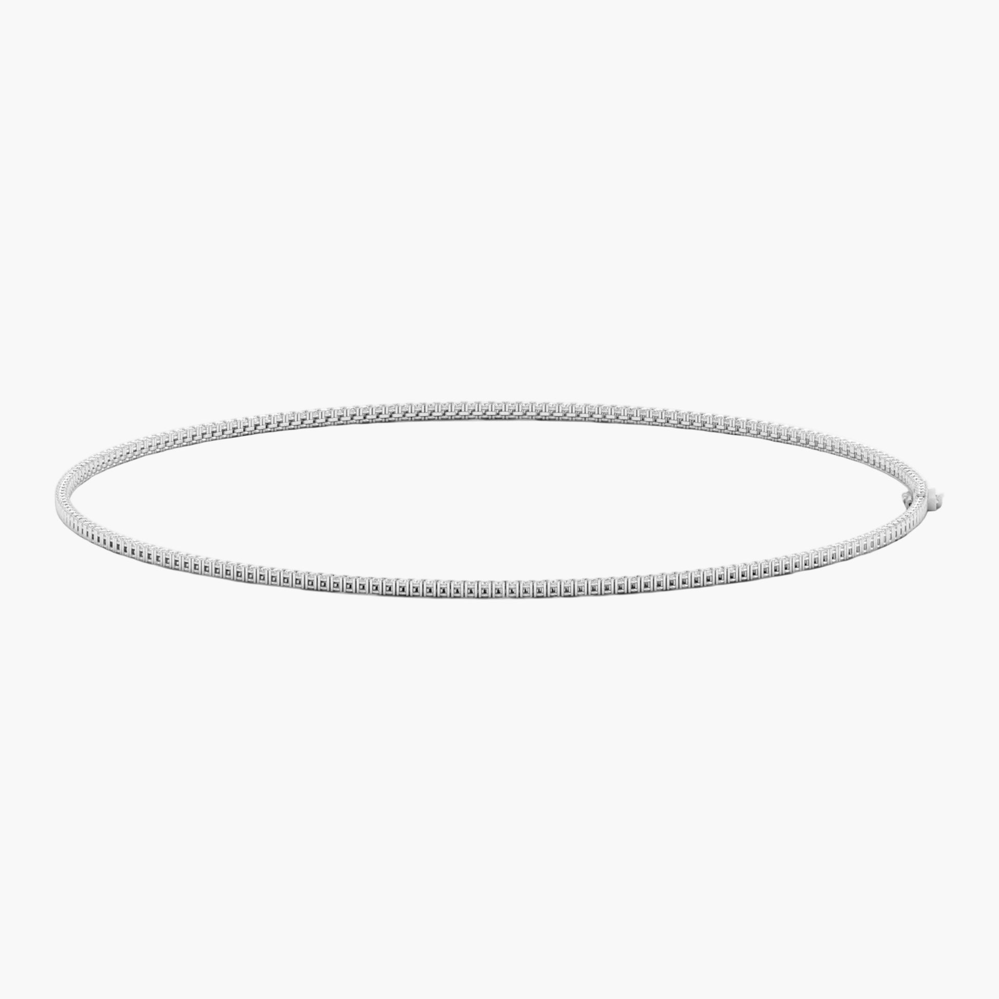 Silver hoop earring on a white background