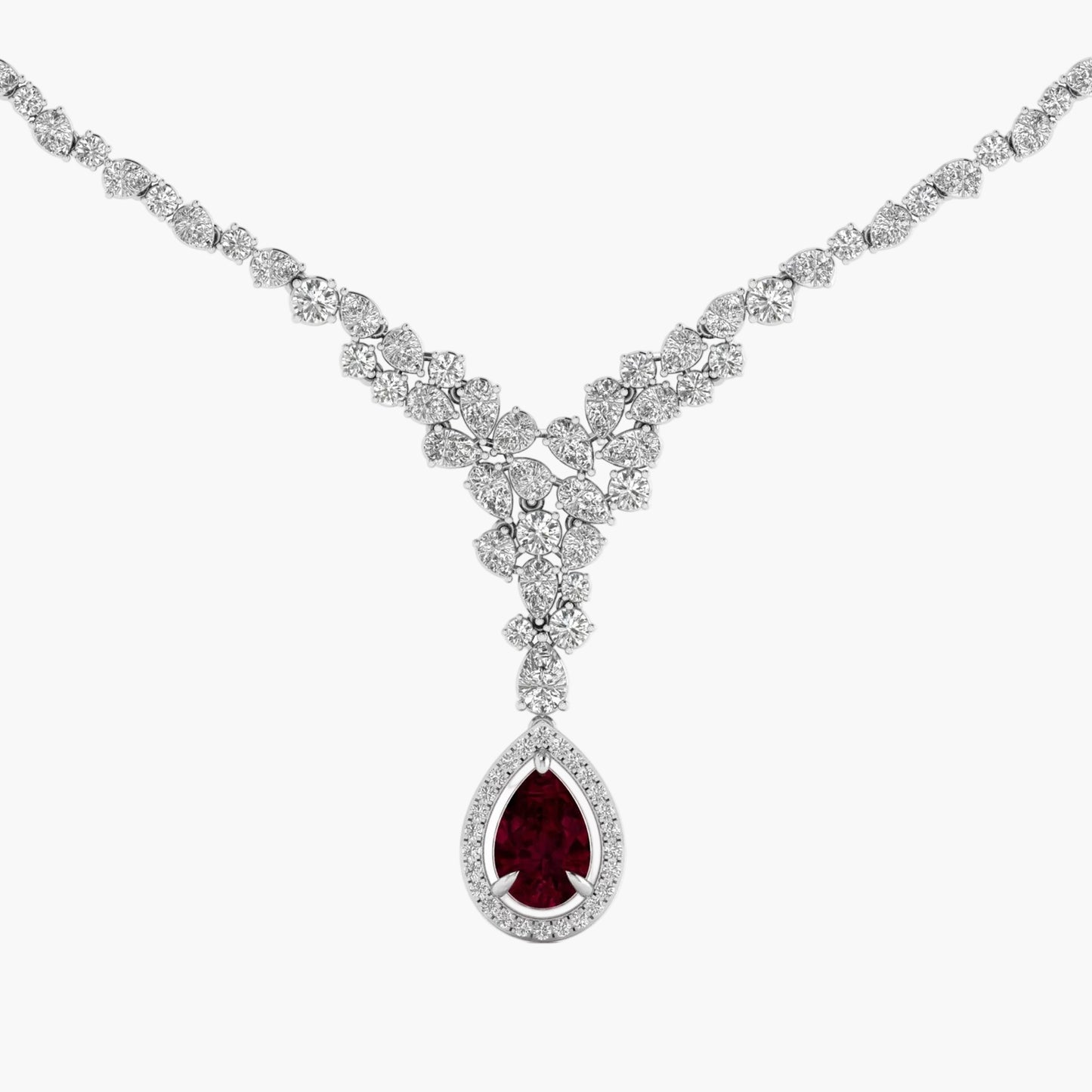 Diamond necklace with a central red gemstone on a white background