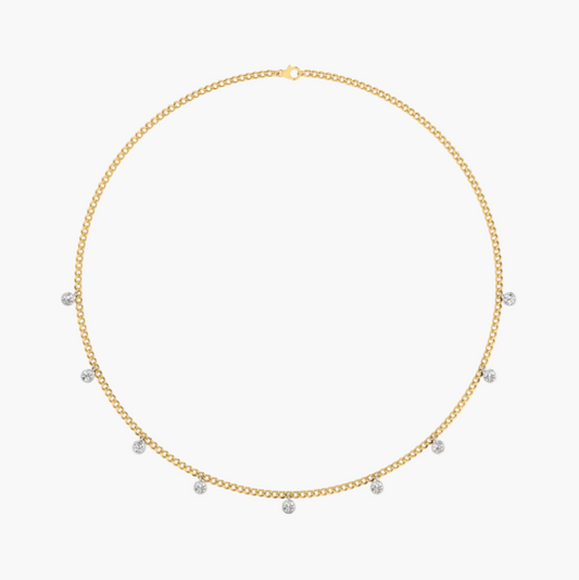 Gold necklace with small round stones on a white background, branded 'Green Lab'.