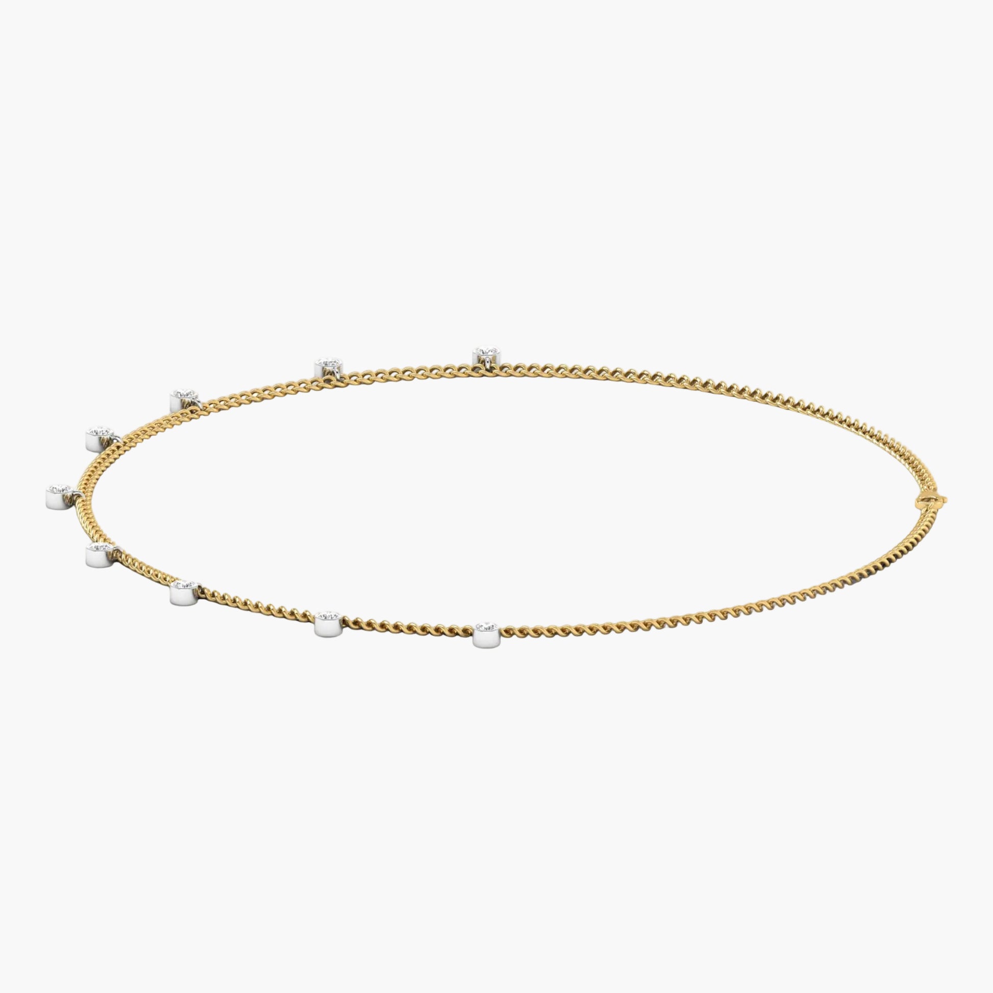 Gold necklace with small pearls on a white background