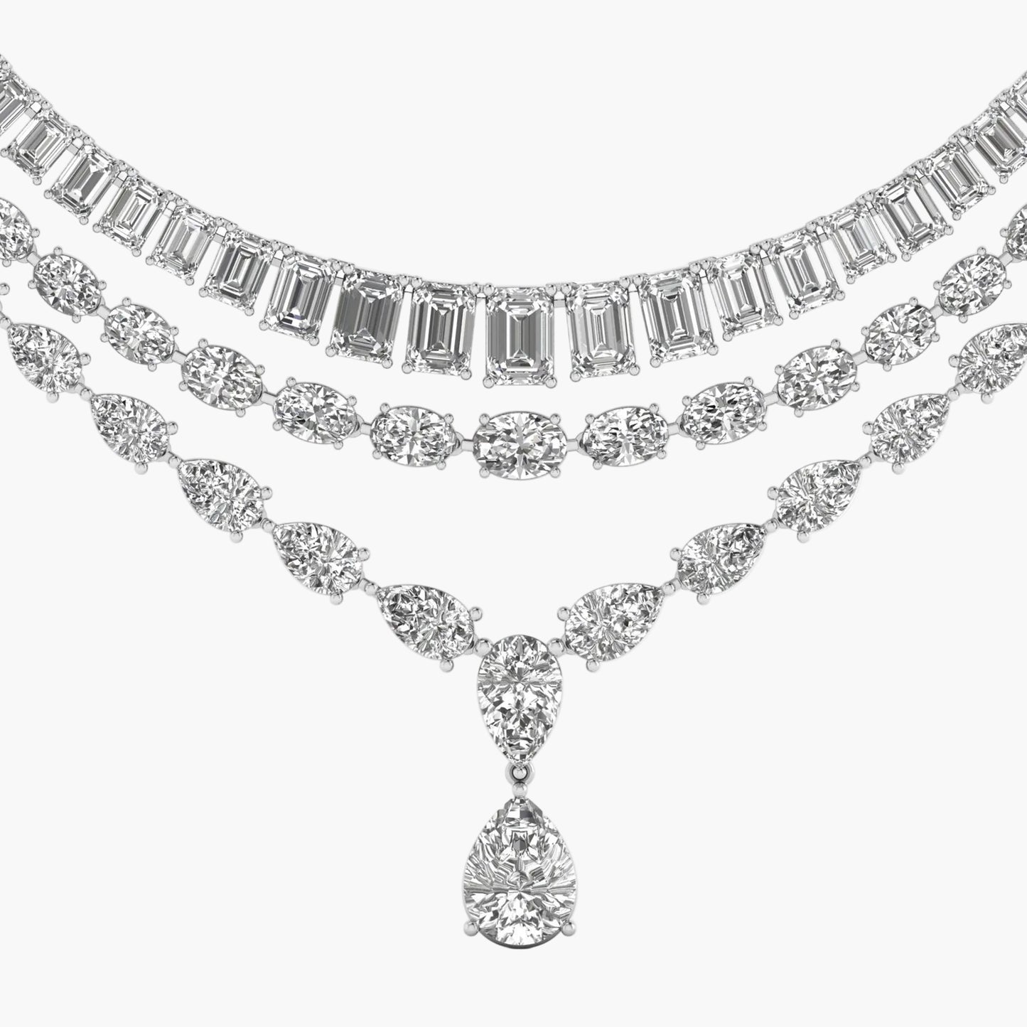 Two diamond necklaces on a white background