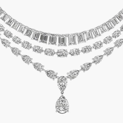 Two diamond necklaces on a white background