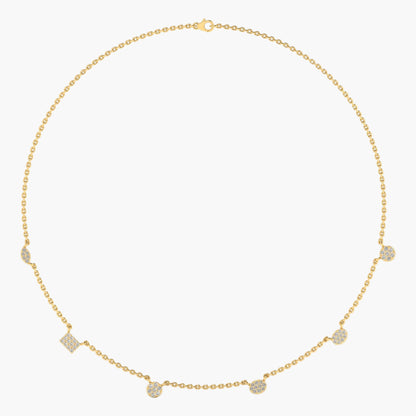 Gold necklace with small diamond-like stones on a white background