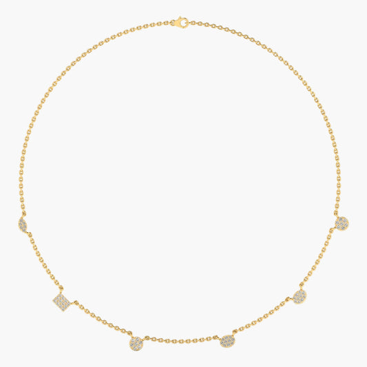 Gold necklace with small diamond-like stones on a white background