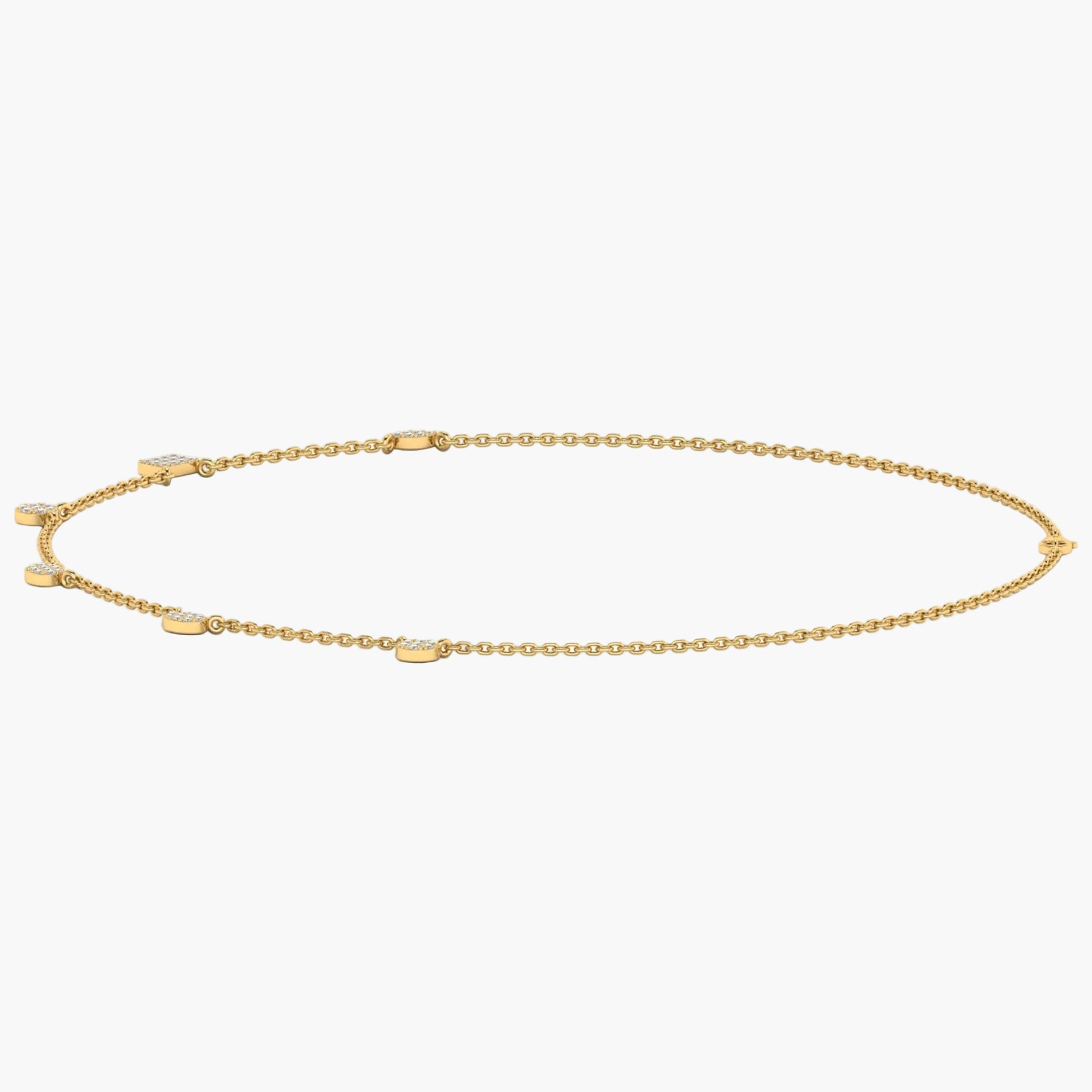 Gold anklet on a white background