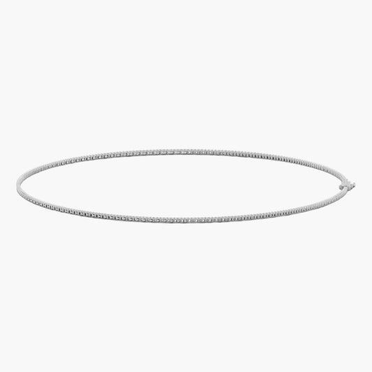 Silver hoop earring on a white background