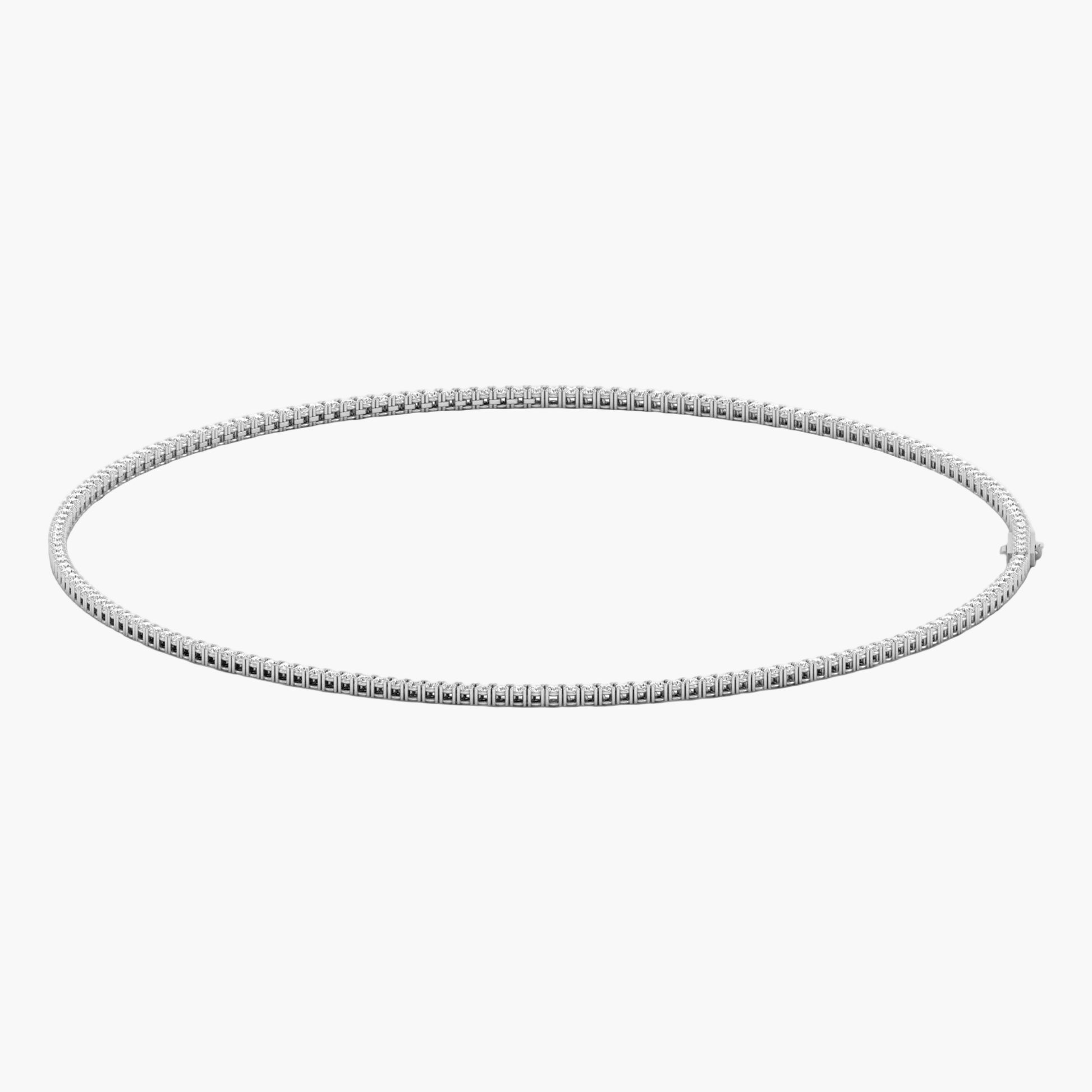 Silver hoop earring on a white background