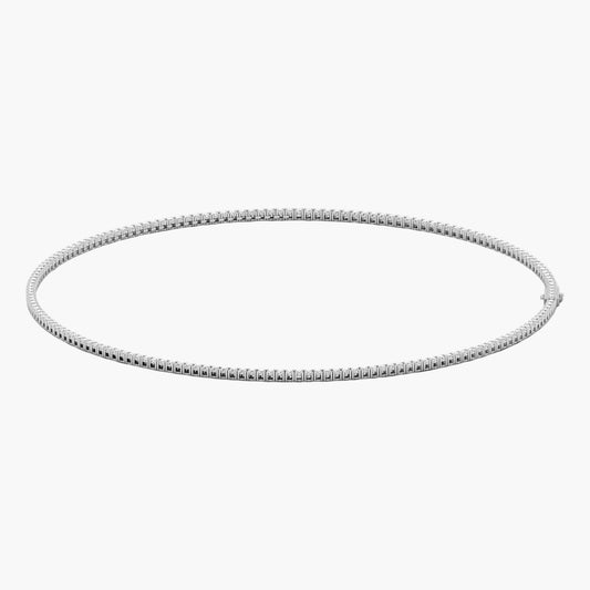 Silver hoop earring on a white background