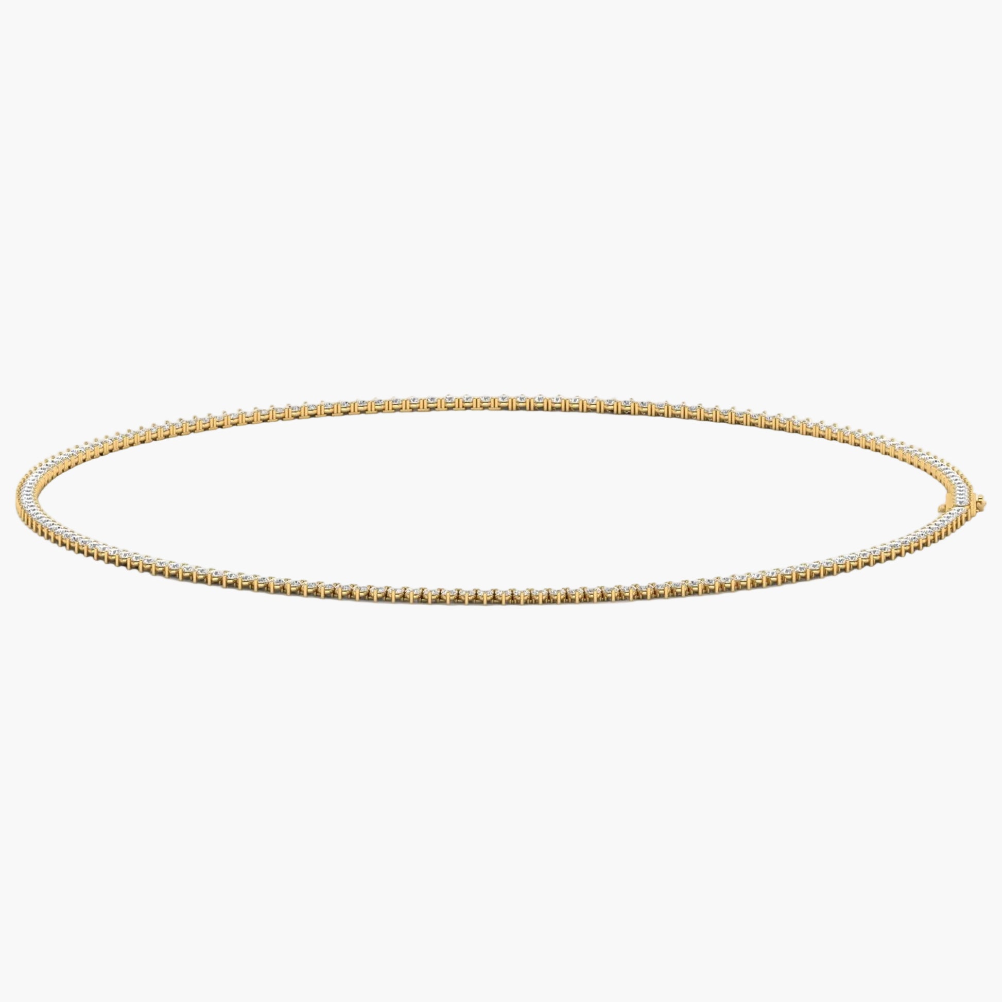 Gold chain necklace on a white background