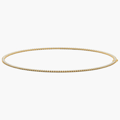Gold chain necklace on a white background