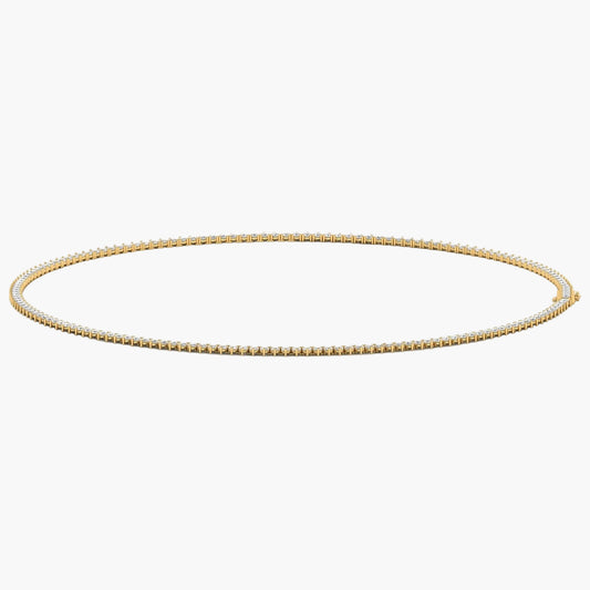 Gold chain necklace on a white background
