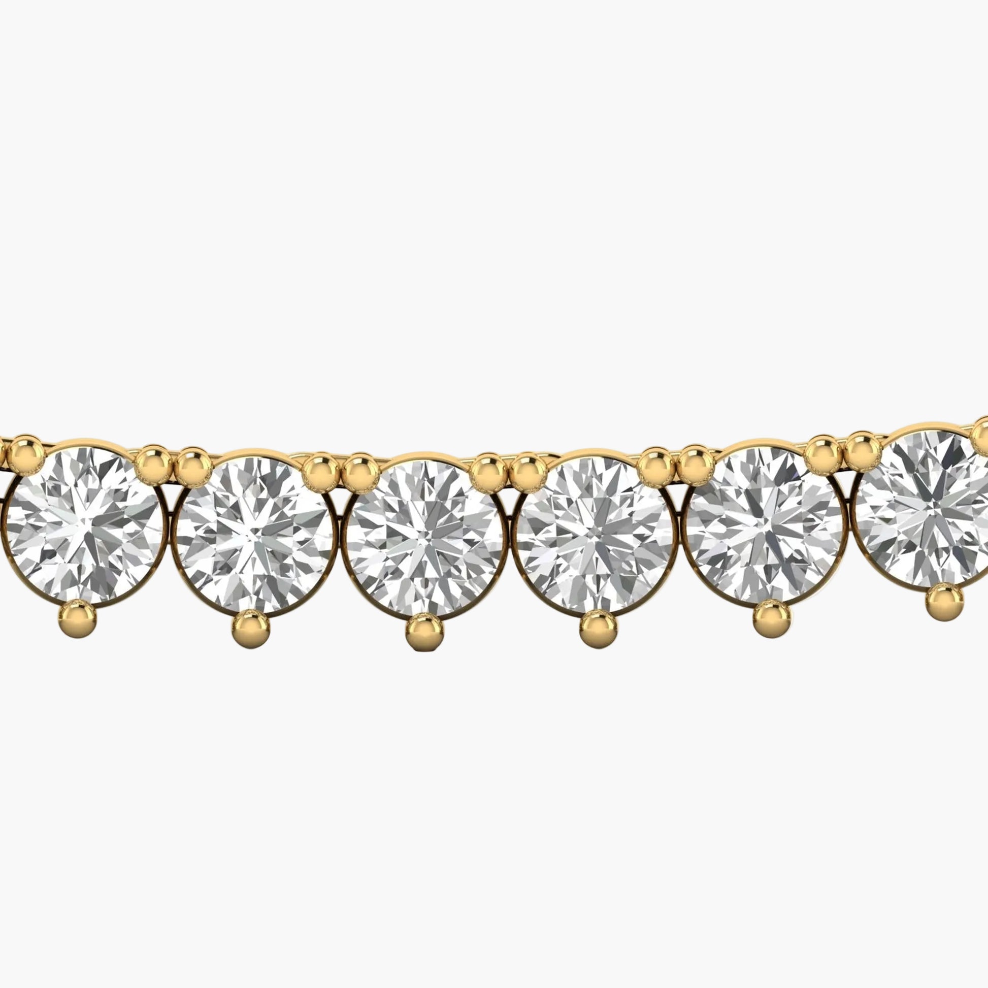Gold bracelet with clear gemstones on a white background