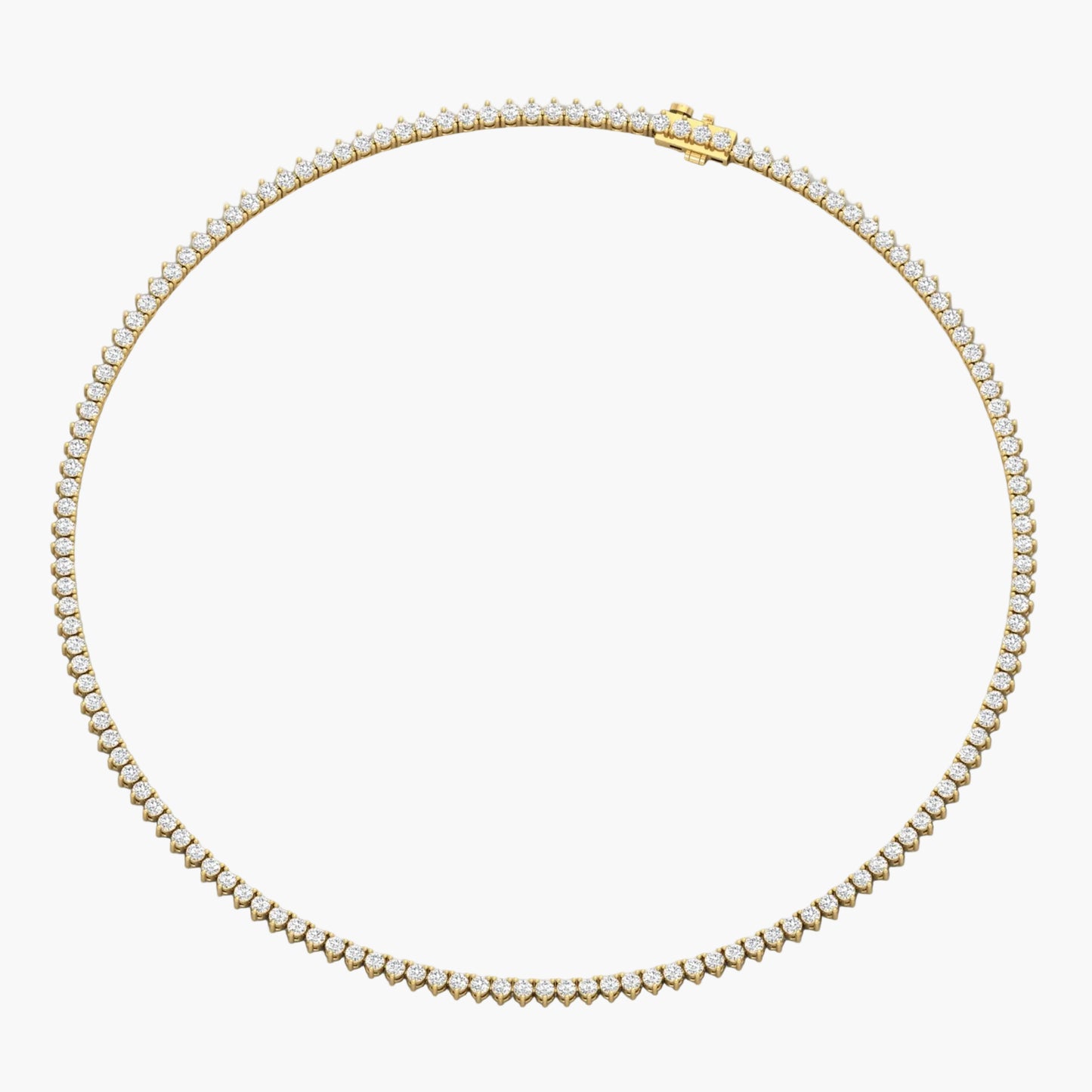 Gold necklace with clear stones on a white background