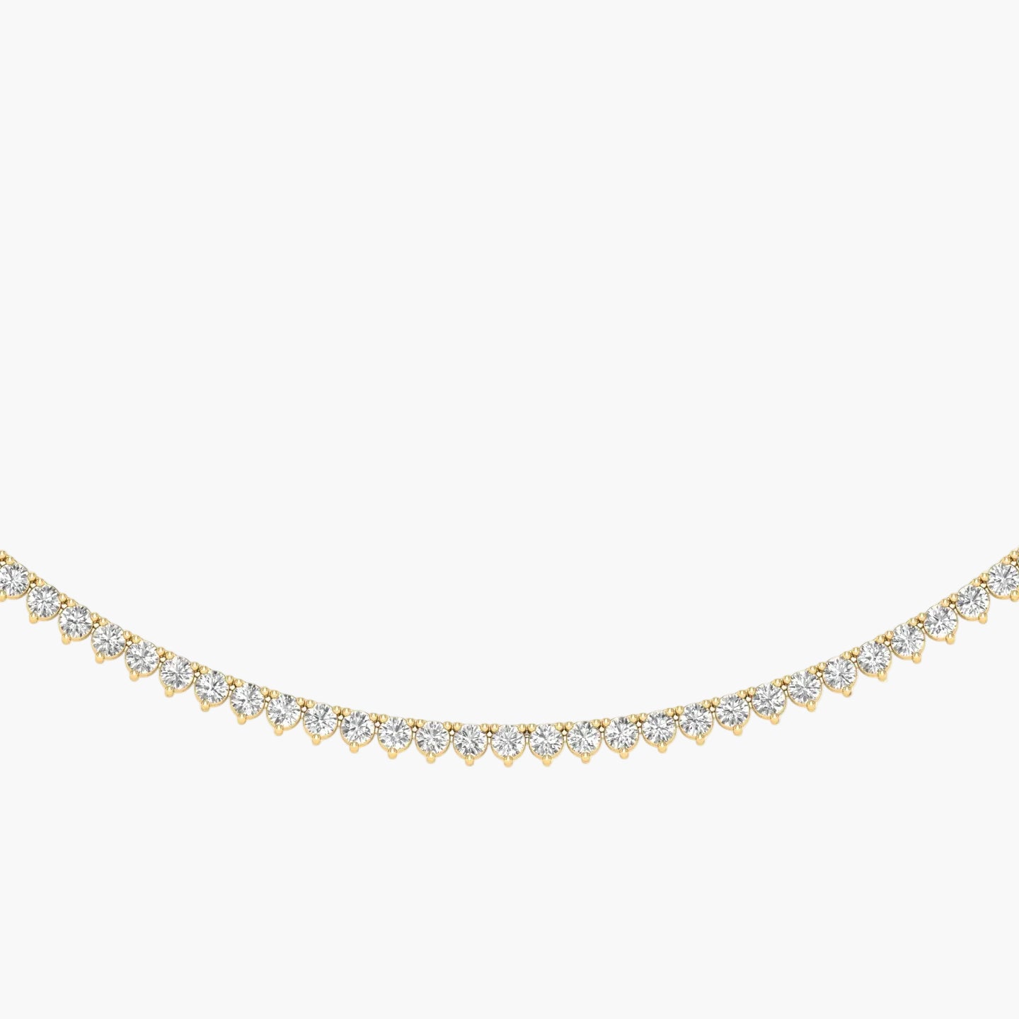 Gold necklace with diamonds on a white background