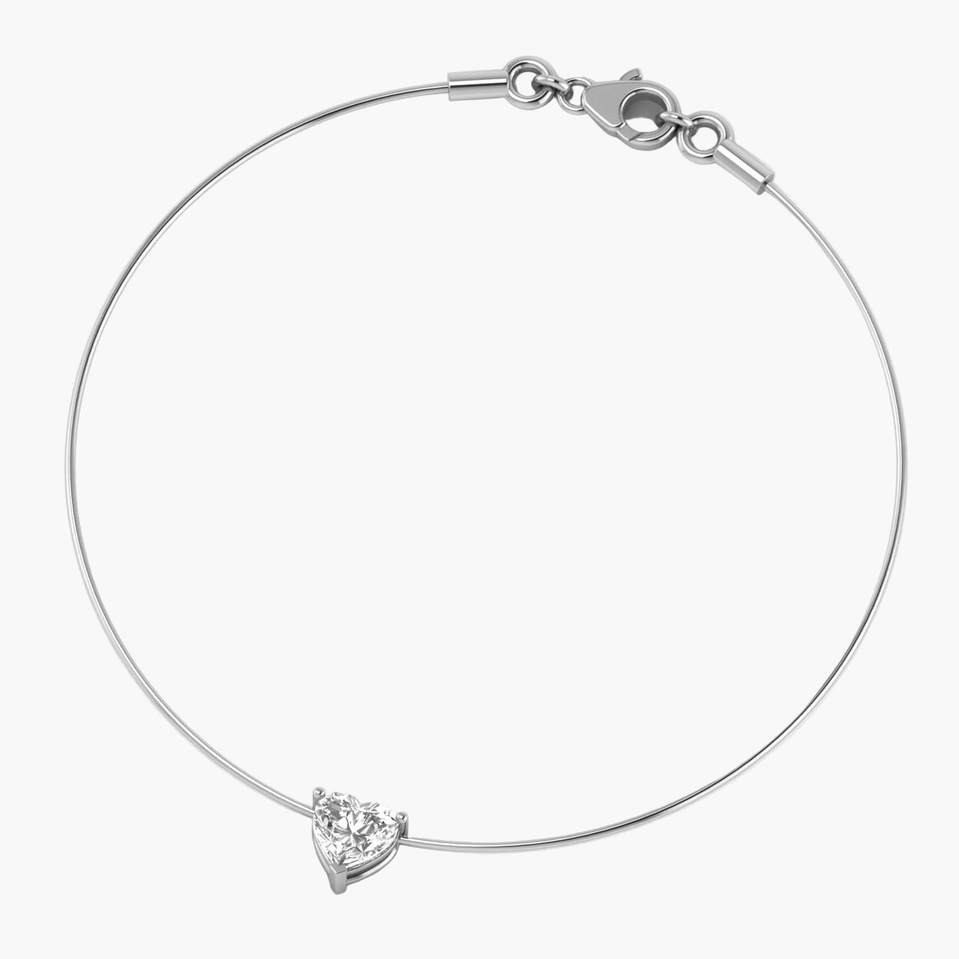 Silver bracelet with a heart-shaped diamond on a white background, branded 'Green Lab'.